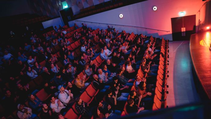 Public sitting in the stands