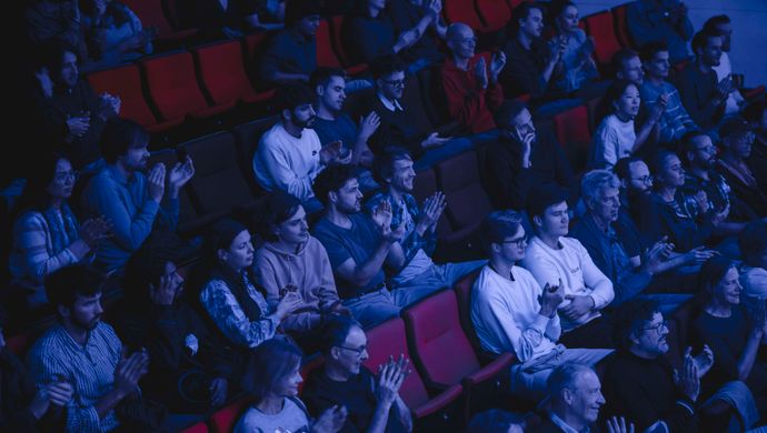 Public sitting in the stands