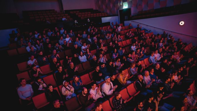 Public sitting in the stands