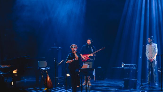 Guitarist, trumpeter and Dhafer Youssef on the stage