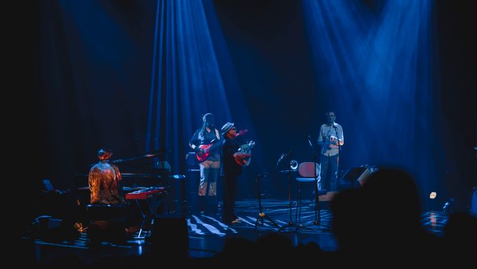 Pianist, guitarist, trumpeter and Dhafer Youssef on the stage. 