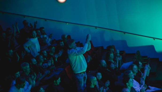 Public sitting in the stands