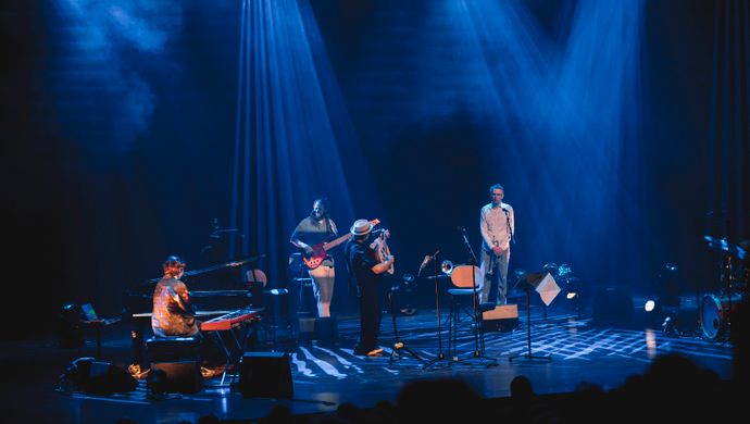 Drummer, pianist, guitarist, trumpeter and Dhafer Youssef on the stage 