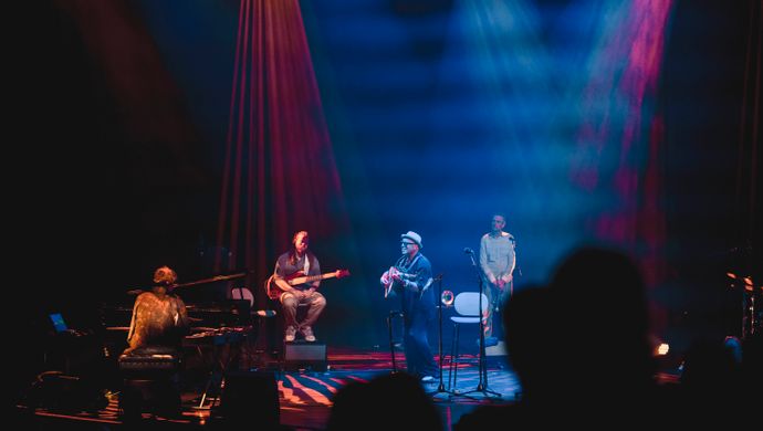 Pianist, guitarist, trumpeter and Dhafer Youssef on the stage. 