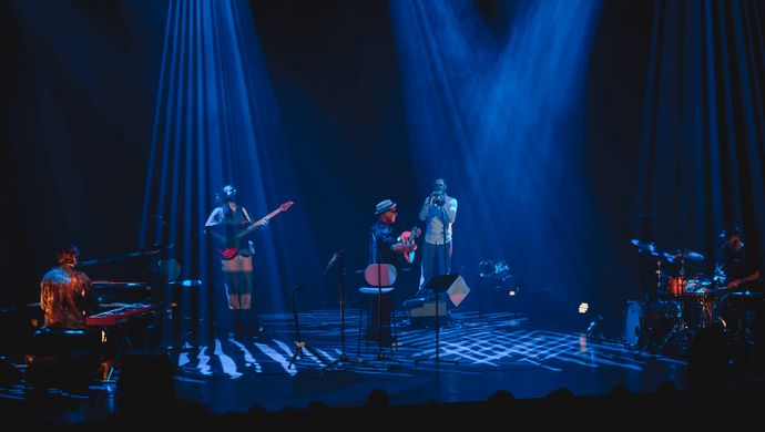 Drummer, pianist, guitarist, trumpeter and Dhafer Youssef on the stage. 