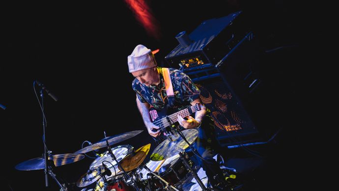 Nate wood playing the drums and bass