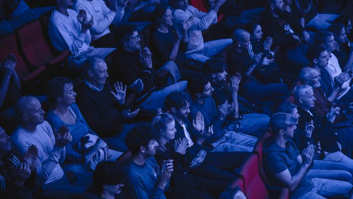 Public sitting in the stands