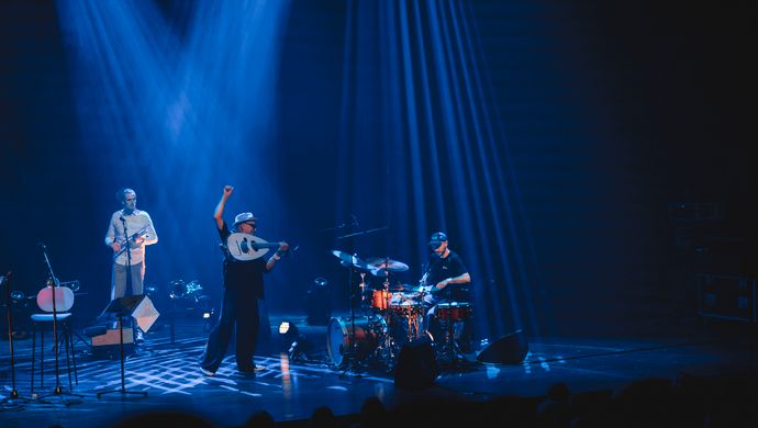 Drummer, trumpeter and Dhafer Youssef on the stage