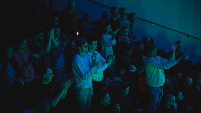 Public sitting in the stands