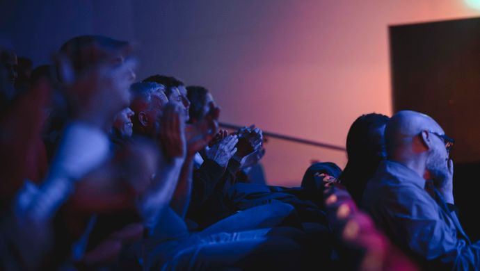 Public sitting in the stands